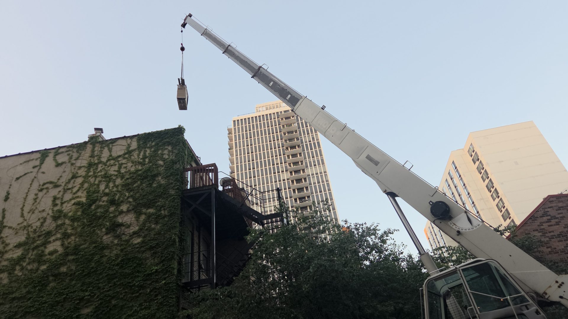 20250724_055600 Ductless Condenser Install using Crane